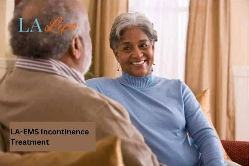 Couple sat smiling at each other - LA-EMS treatment Crawley