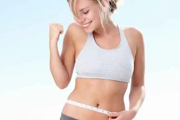 woman happy after fat reduction treatment Crawley
