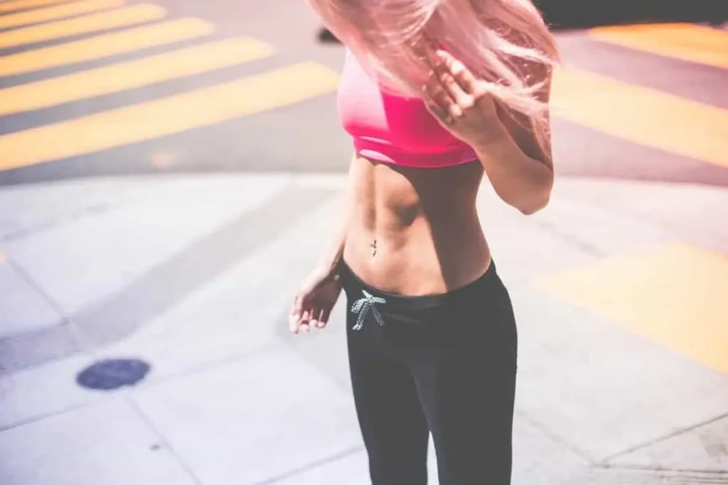 Woman with toned stomach after LA-EMS Body Sculpting Treatment Crawley
